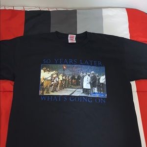 Men’s “50 Years Later” Black Bayside T-Shirt